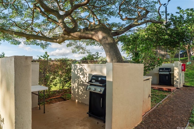 98-099 Uao Pl Unit 2408, Aiea, HI 96701 - view of patio featuring grilling area and fence