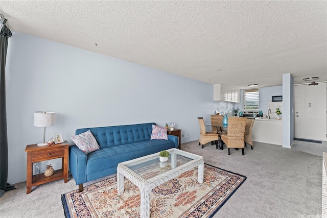 98-099 Uao Pl Unit 2408, Aiea, HI 96701 - living room featuring light colored carpet and a textured ceiling