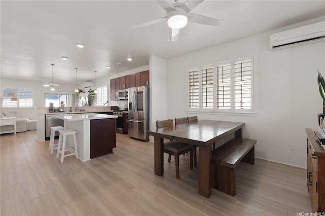 91-1139 Iliahialoe Loop, Ewa Beach, HI 96706 - dining room with ceiling fan, an AC wall unit, recessed lighting, and light wood-style floors