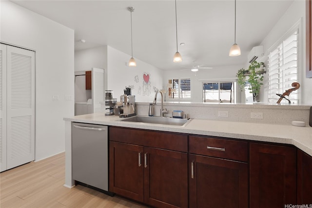 91-1139 Iliahialoe Loop, Ewa Beach, HI 96706 - kitchen with stainless steel dishwasher, a sink, light wood finished floors, a ceiling fan, and a wall unit AC