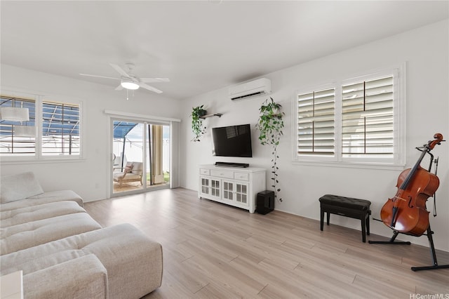 91-1139 Iliahialoe Loop, Ewa Beach, HI 96706 - living room featuring an AC wall unit, light wood-type flooring, and a ceiling fan