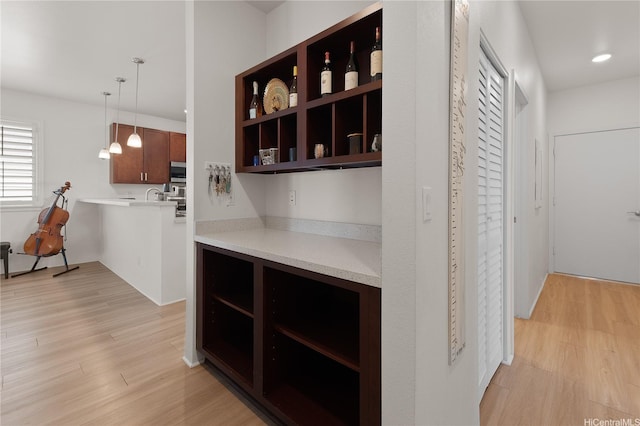 91-1139 Iliahialoe Loop, Ewa Beach, HI 96706 - bar with light wood-style floors, hanging light fixtures, and recessed lighting