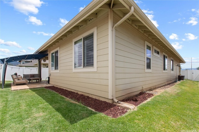 91-1139 Iliahialoe Loop, Ewa Beach, HI 96706 - view of home's exterior featuring a patio and central AC unit