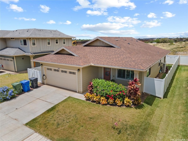 91-1139 Iliahialoe Loop, Ewa Beach, HI 96706 - view of front of property featuring an attached garage, roof with shingles, driveway, and board and batten siding