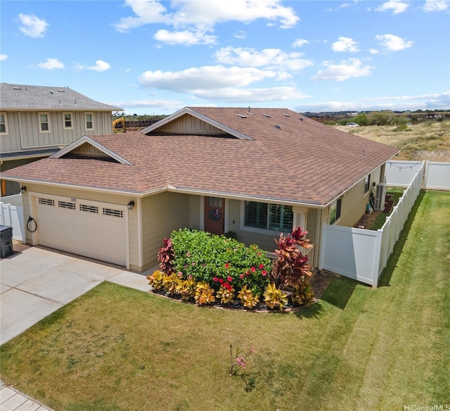 91-1139 Iliahialoe Loop, Ewa Beach, HI 96706 - view of front of home with roof with shingles, a garage, and driveway