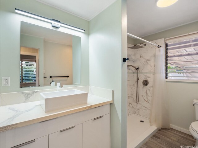 3622 Maunalei Ave, Honolulu, HI 96816 - full bath featuring toilet, a marble finish shower, vanity, and wood finished floors