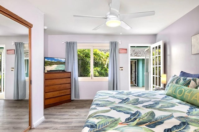 49 Pilipu Pl, Kailua, HI 96734 - bedroom with wood finished floors, ceiling fan, access to exterior, and baseboards