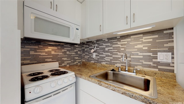2888 Ala Ilima St Unit 512, Honolulu, HI 96818 - kitchen with white appliances, a sink, white cabinets, and tasteful backsplash