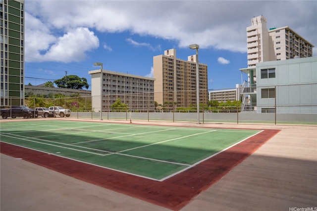 2888 Ala Ilima St Unit 512, Honolulu, HI 96818 - view of tennis court with fence and community basketball court