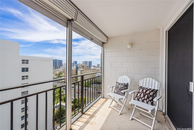 balcony featuring a view of city