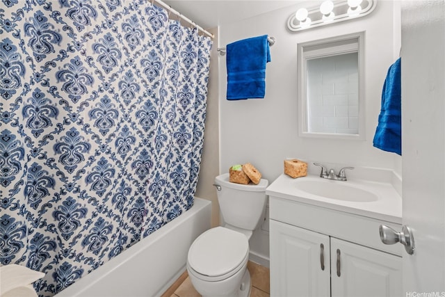 bathroom with toilet, vanity, and shower / bathtub combination with curtain