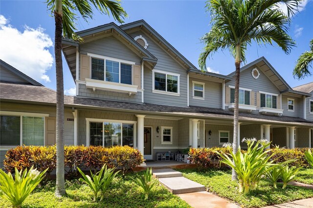 91-1121 Keoneula Blvd Unit L2, Ewa Beach, HI 96706 - view of front of home featuring a porch and roof with shingles