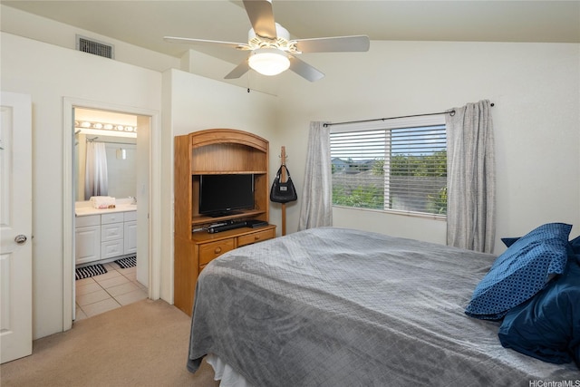 91-1121 Keoneula Blvd Unit L2, Ewa Beach, HI 96706 - bedroom with light carpet, light tile patterned floors, ceiling fan, and connected bathroom