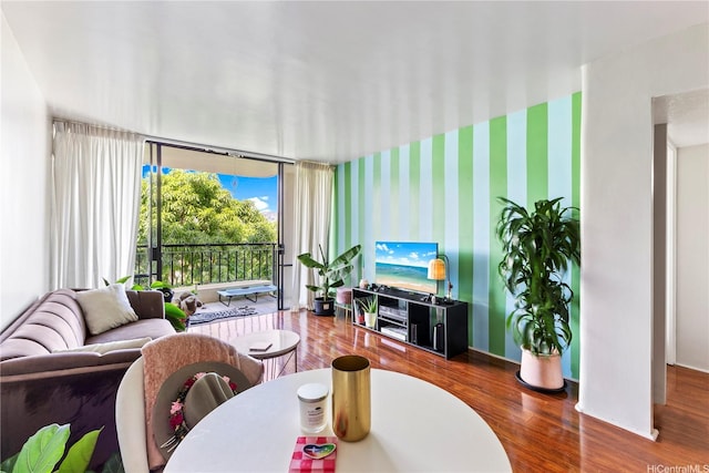 440 Seaside Ave Unit 404, Honolulu, HI 96815 - living area with wood finished floors and wallpapered walls