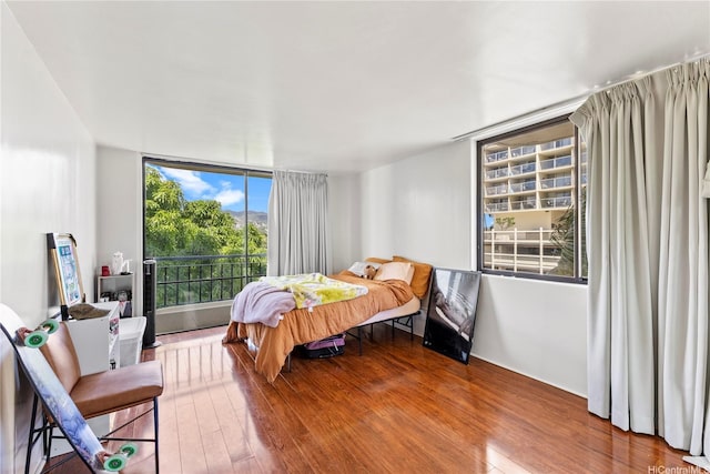 440 Seaside Ave Unit 404, Honolulu, HI 96815 - bedroom with wood finished floors