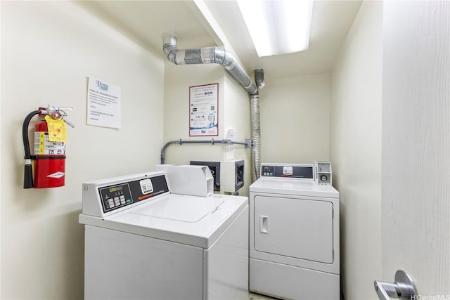 440 Seaside Ave Unit 404, Honolulu, HI 96815 - community laundry room with washing machine and clothes dryer