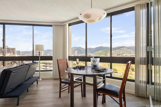 300 Wai Nani Way Unit 1902, Honolulu, HI 96815 - sunroom / solarium featuring a mountain view and healthy amount of natural light