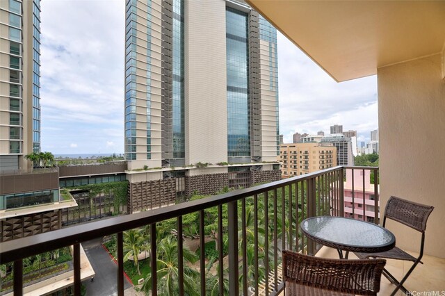 balcony featuring a city view