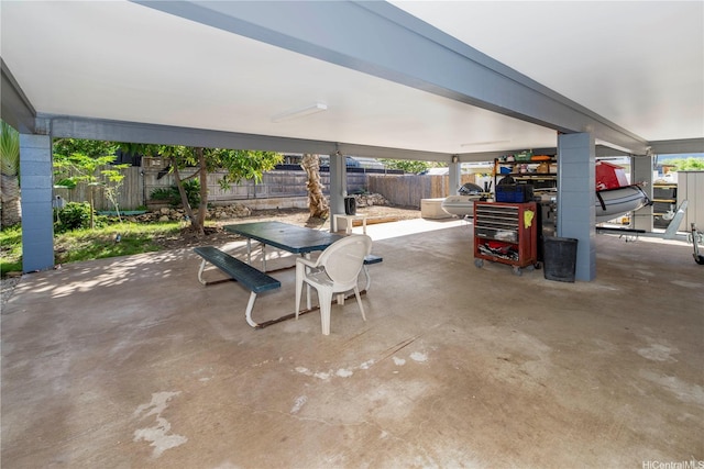 view of patio with a fenced backyard and outdoor dining space