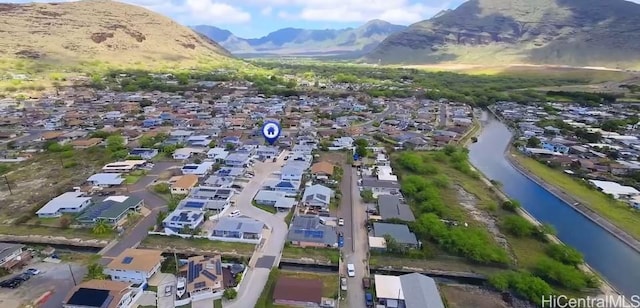 87-1720 Farrington Hwy Unit 23, Waianae, HI 96792 - aerial overview of property's location with nearby suburban area and mountains