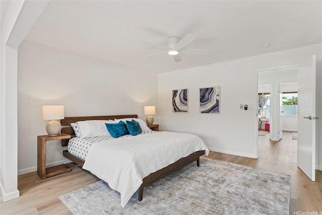 94-78 Aaahi Pl, Mililani, HI 96789 - bedroom featuring light wood-style flooring, baseboards, and a ceiling fan