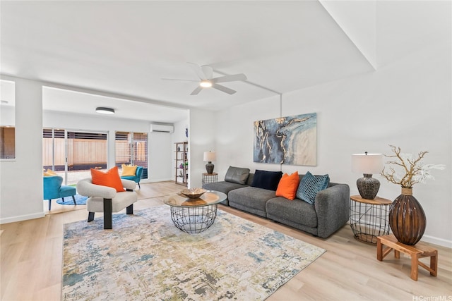 94-78 Aaahi Pl, Mililani, HI 96789 - living area featuring a wall mounted air conditioner, wood finished floors, baseboards, and a ceiling fan