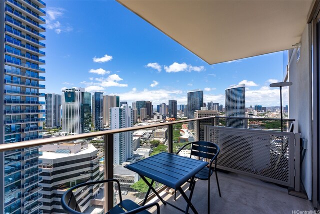 1388 Kapiolani Blvd Unit 2702, Honolulu, HI 96814 - balcony featuring a view of skyline