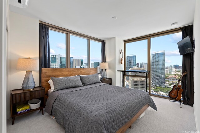 1388 Kapiolani Blvd Unit 2702, Honolulu, HI 96814 - bedroom with light colored carpet and floor to ceiling windows