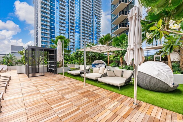 1388 Kapiolani Blvd Unit 2702, Honolulu, HI 96814 - wooden deck featuring outdoor lounge area