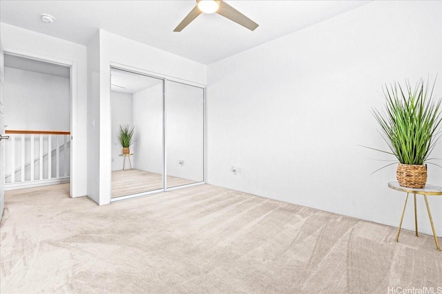 91-3390 Maohiohi Loop, Ewa Beach, HI 96706 - unfurnished bedroom with carpet flooring, a closet, and a ceiling fan