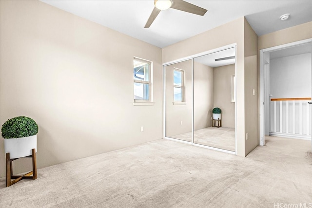 91-3390 Maohiohi Loop, Ewa Beach, HI 96706 - unfurnished bedroom featuring carpet, a closet, and a ceiling fan