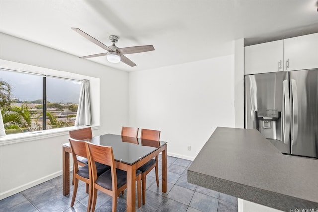 46-010 Aliikane Pl Unit 211, Kaneohe, HI 96744 - tiled dining area featuring ceiling fan and baseboards