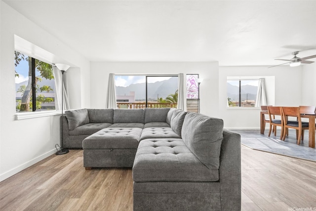 46-010 Aliikane Pl Unit 211, Kaneohe, HI 96744 - living room featuring wood finished floors, a ceiling fan, and baseboards