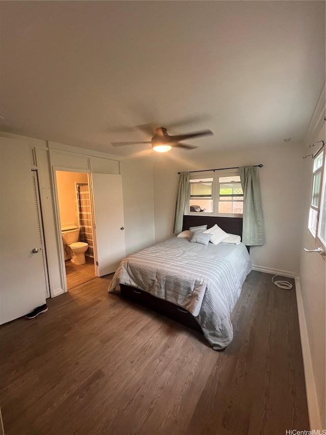 45-342 Lehuuila St, Kaneohe, HI 96744 - bedroom with wood finished floors, baseboards, ensuite bath, and a ceiling fan