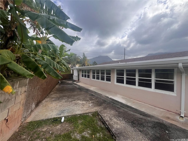 45-342 Lehuuila St, Kaneohe, HI 96744 - view of home's exterior with a shingled roof and fence