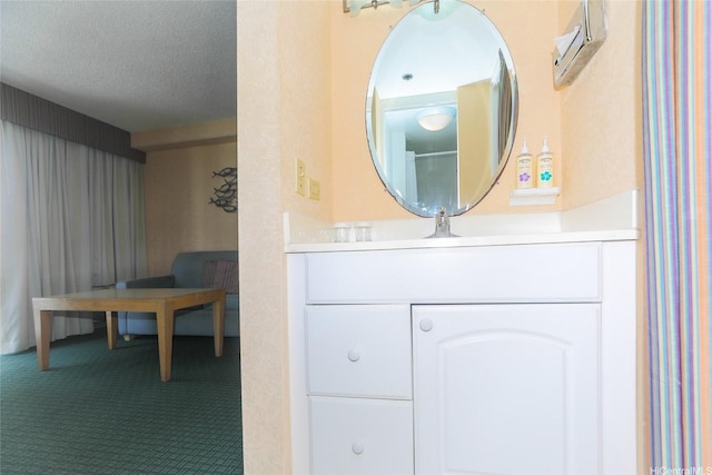 444 Kanekapolei St Unit 507, Honolulu, HI 96815 - bathroom featuring vanity and a textured ceiling
