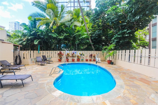 444 Kanekapolei St Unit 507, Honolulu, HI 96815 - view of swimming pool featuring a patio area and a fenced backyard