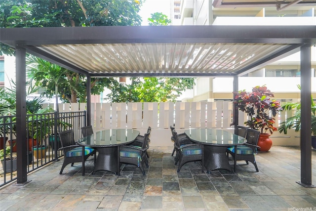 444 Kanekapolei St Unit 507, Honolulu, HI 96815 - view of patio with outdoor dining area