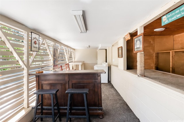1506 Frear St Unit A, Honolulu, HI 96813 - indoor dry bar with washer / dryer and dark carpet