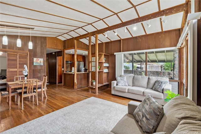 18 Dole Rd, Wahiawa, HI 96786 - living area featuring wooden walls, wood finished floors, and vaulted ceiling