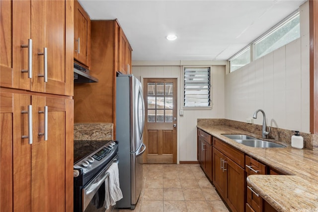 18 Dole Rd, Wahiawa, HI 96786 - kitchen with stainless steel appliances, a sink, under cabinet range hood, brown cabinets, and light stone counters