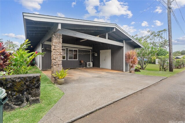 18 Dole Rd, Wahiawa, HI 96786 - view of front of property featuring driveway, a carport, and fence