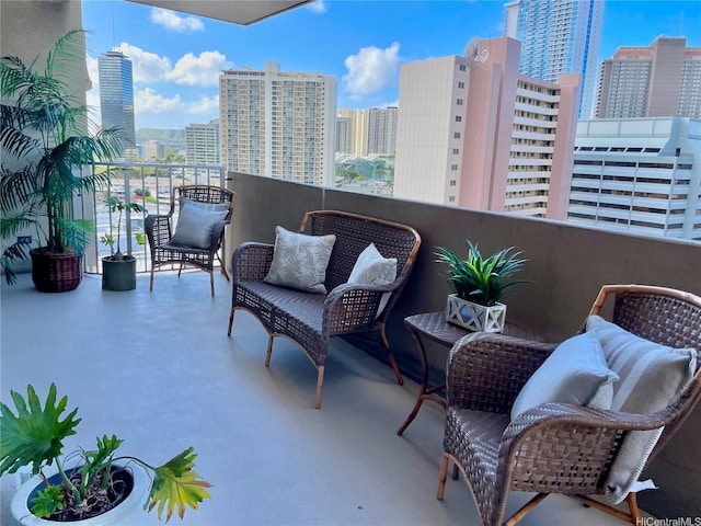 1561 Kanunu St Unit 1206, Honolulu, HI 96814 - balcony featuring a view of skyline
