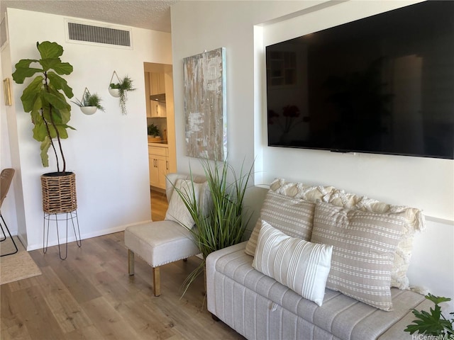1561 Kanunu St Unit 1206, Honolulu, HI 96814 - living area with wood finished floors