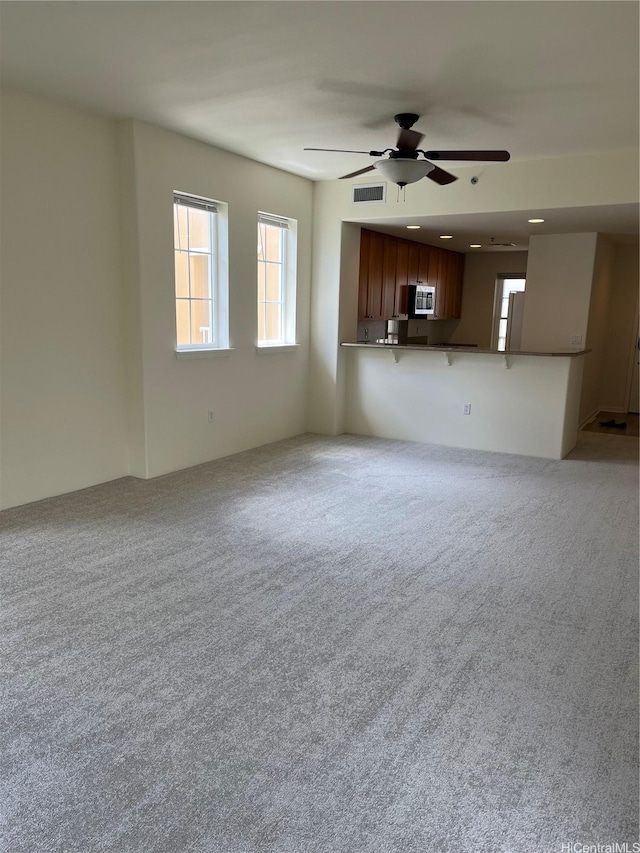 520 Lunalilo Home Rd Unit 7414, Honolulu, HI 96825 - unfurnished living room featuring ceiling fan, carpet floors, and recessed lighting