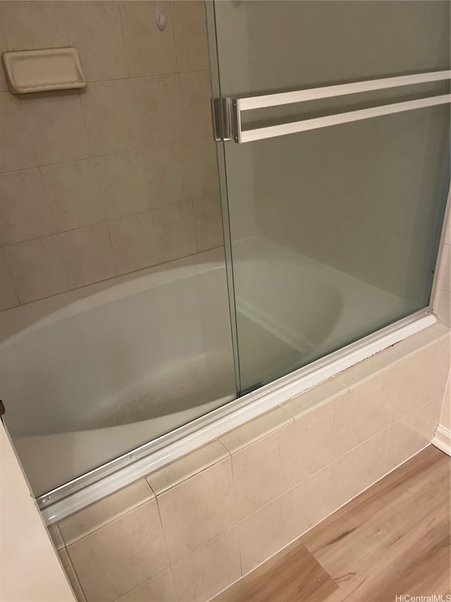 520 Lunalilo Home Rd Unit 7414, Honolulu, HI 96825 - full bath with wood finished floors, a shower, and a tub