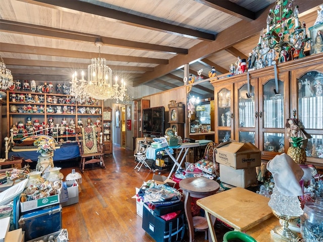 dining space featuring a chandelier and wood finished floors