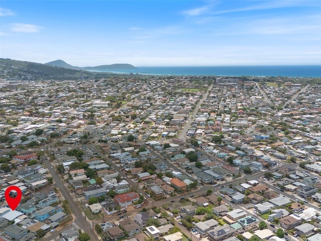 aerial view of property and surrounding area with mountains