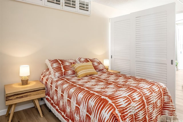 2801 Coconut Ave Unit 2G, Honolulu, HI 96815 - bedroom with wood finished floors