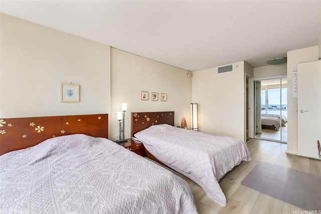 bedroom featuring wood finished floors